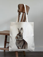 Rabbit tote bag made from eco-friendly linen, featuring realistic rabbit artwork. Ideal reusable shopping bag for women and nature lovers.