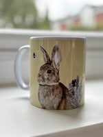 Rabbit Mug featuring hand-drawn British wild rabbit and bees by Georgie Turner. Country kitchenware coffee mug for animal lovers.