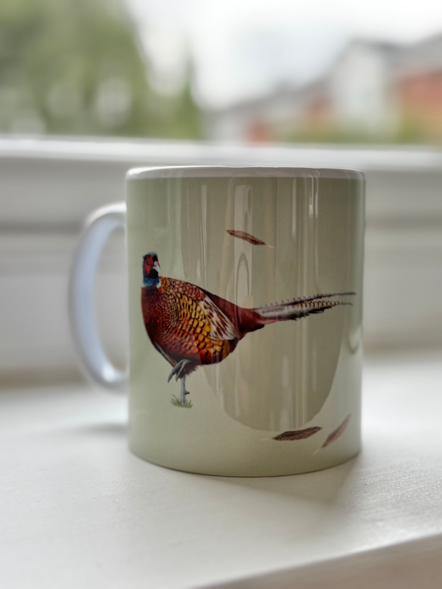 Pheasant Mug featuring hand-drawn game bird art by Georgie Turner, ideal for country kitchenware and country shoot enthusiasts.