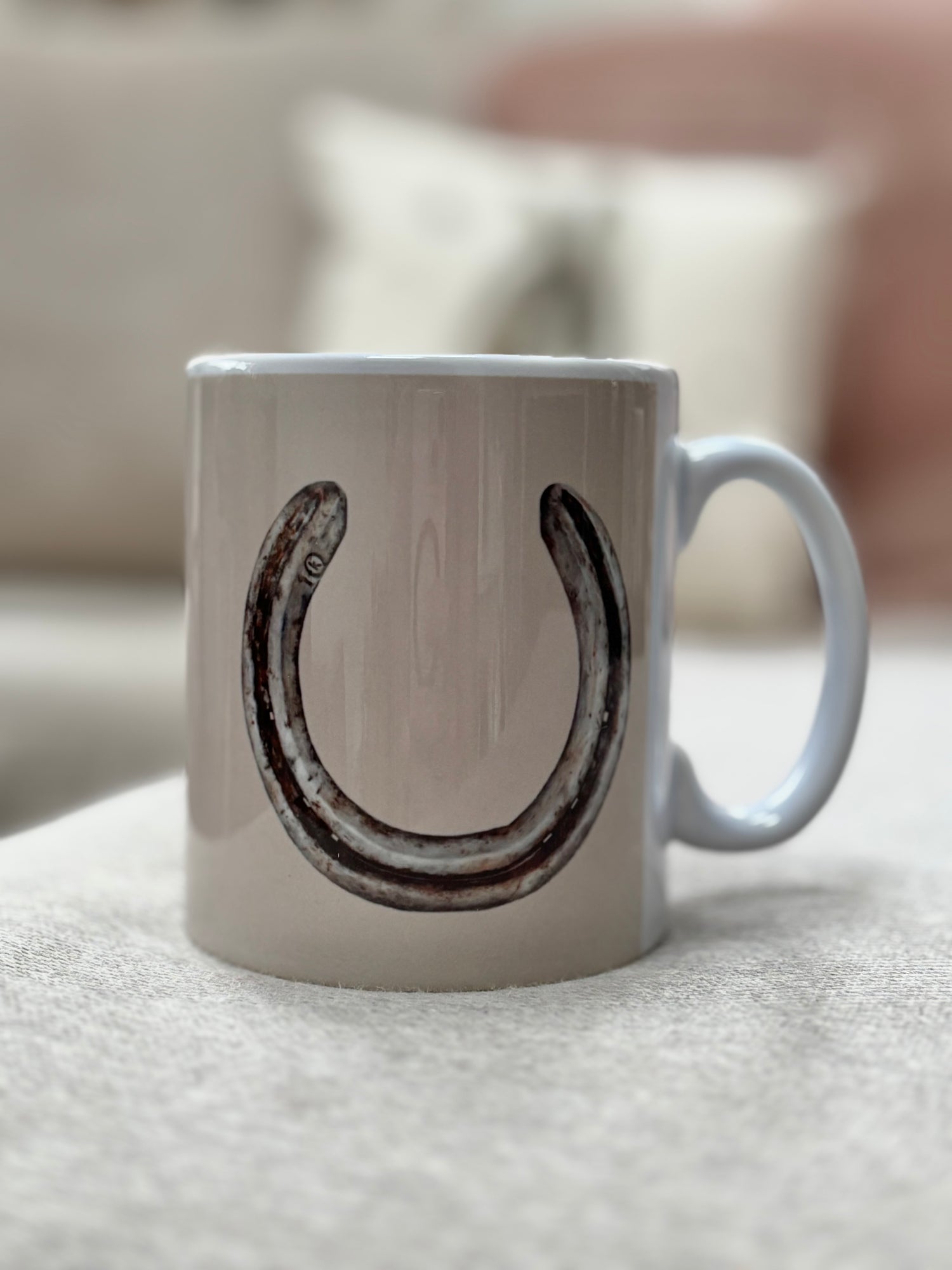 Horseshoe Mug with hand-drawn horseshoe design by Georgie Turner, perfect for country kitchen decor and horse lover gifts.