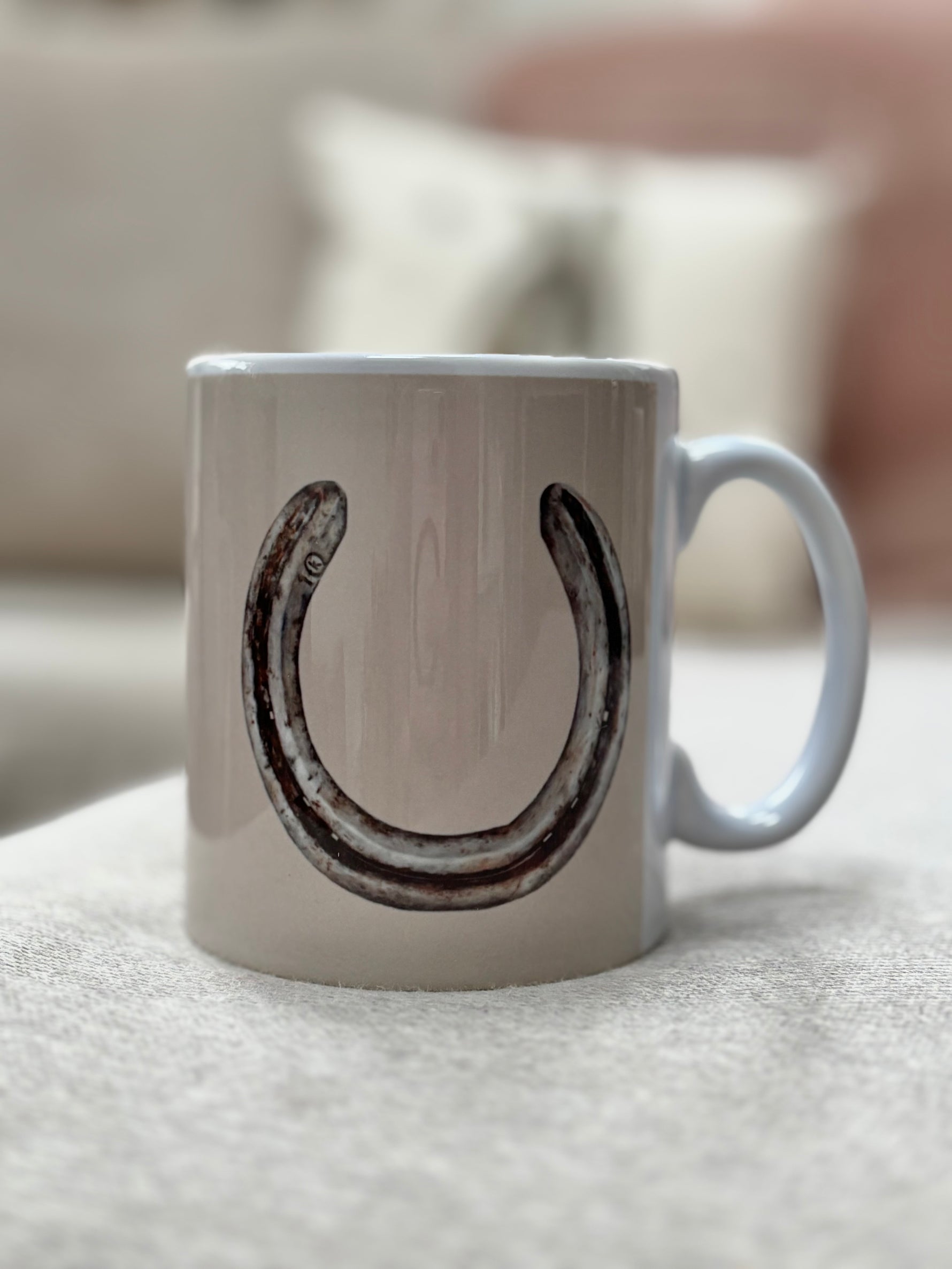 Horseshoe Mug with hand-drawn horseshoe design by Georgie Turner, perfect for country kitchen decor and horse lover gifts.