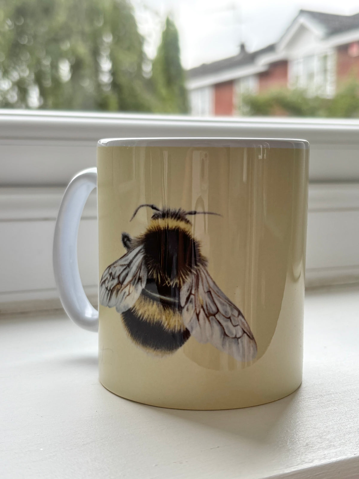 Bumble Bee Mug featuring hand-drawn British wild animal art by Georgie Turner. Ideal for country kitchen coffee lovers and animal-themed tableware.