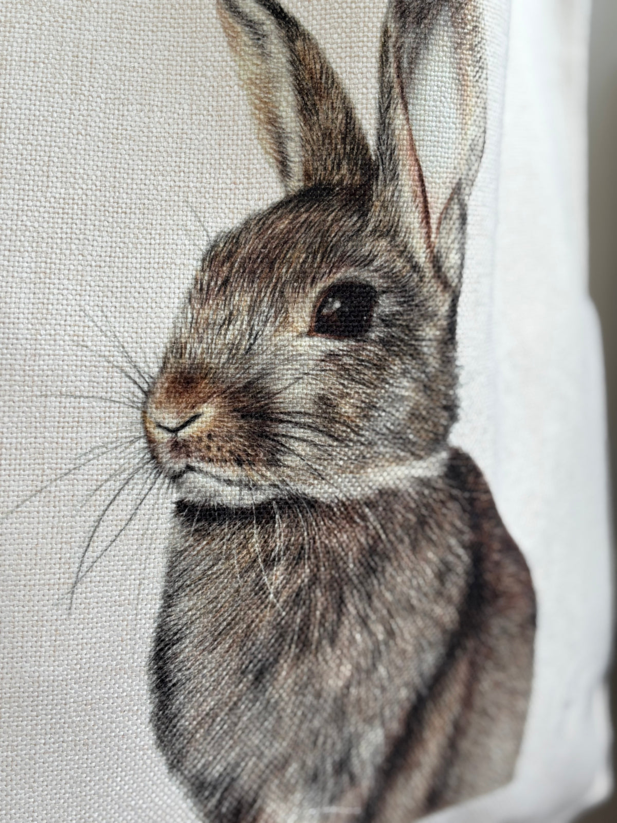 Close-up of rabbit artwork on eco-friendly linen tote bag. Detailed design highlights British wildlife, perfect for tote bag gift ideas.