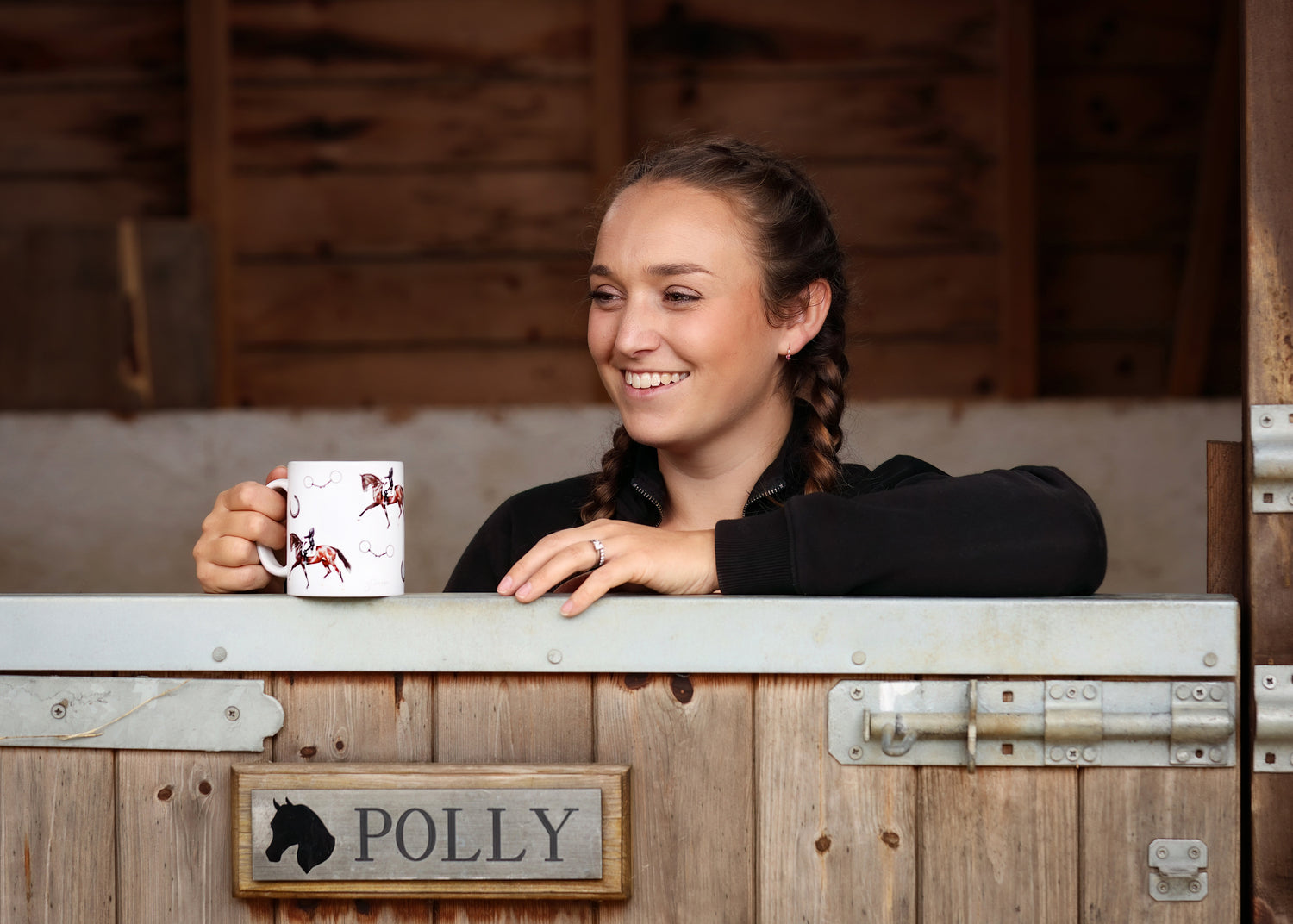 Woman holding Dressage Mug - Country Kitchen in stable setting. Perfect horse lover gift and country kitchenware accessory.