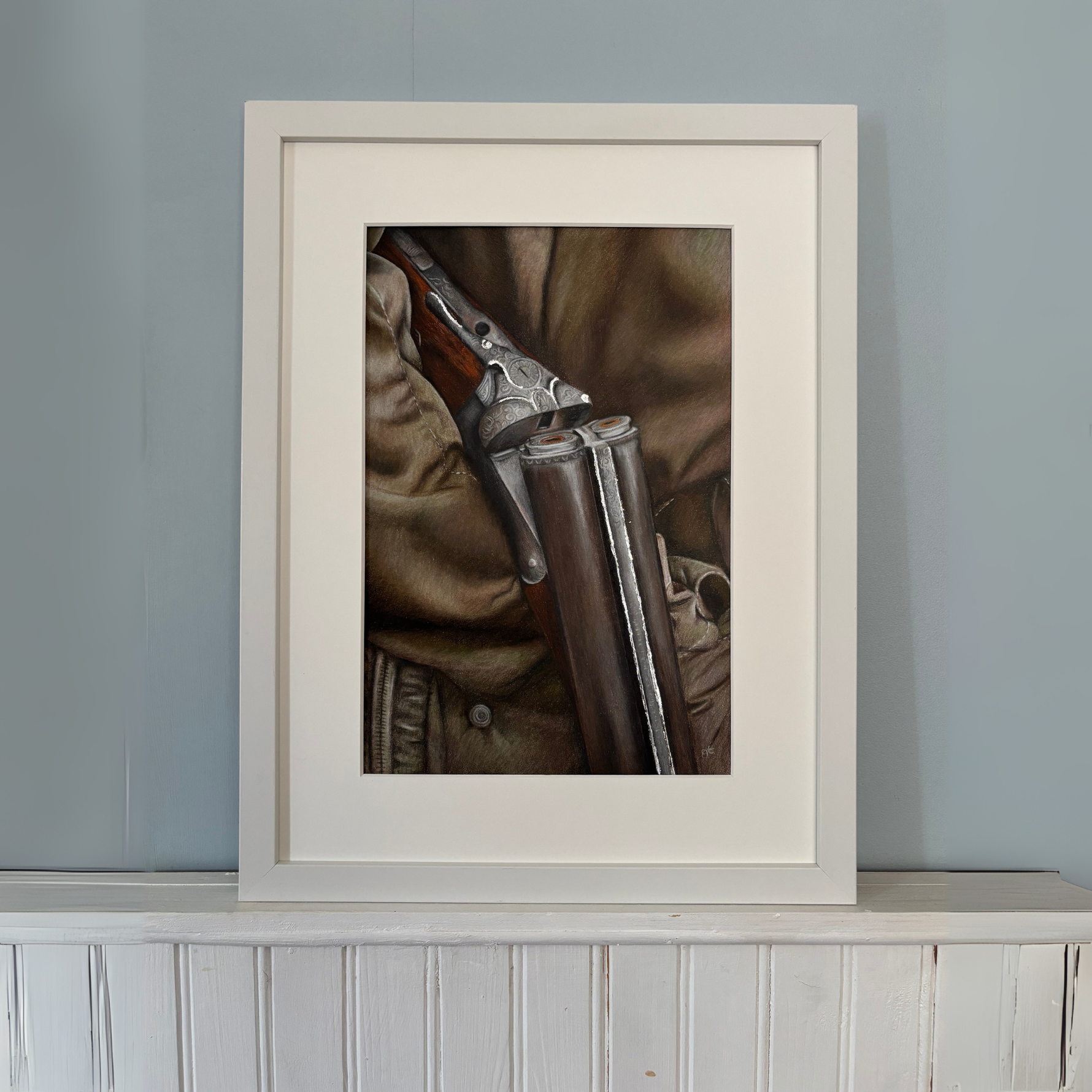 Country shoot original artwork titled 'Between The Drives' by Georgie Turner, framed and displayed on a mantel. Ideal for country home decor.