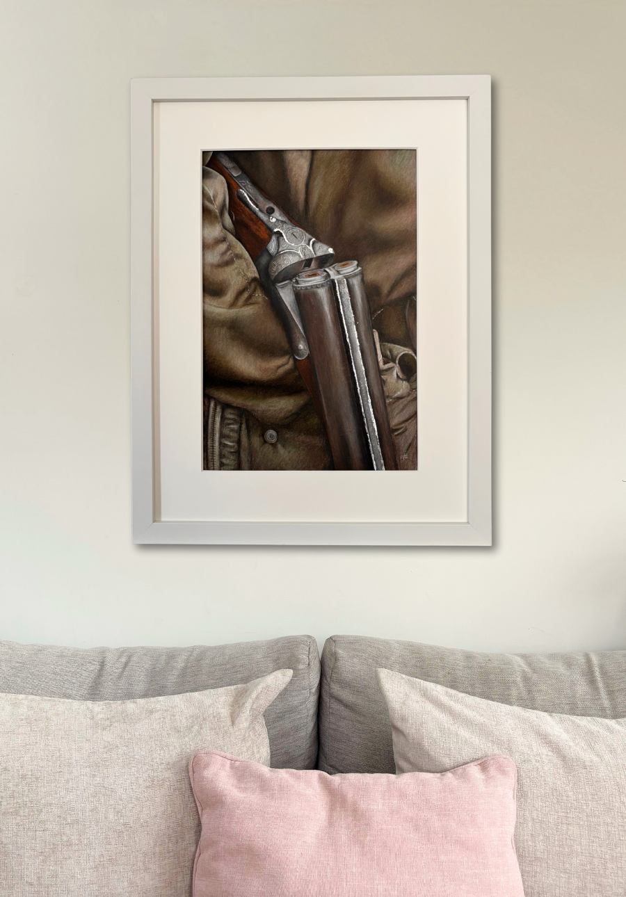 Framed original artwork 'Between The Drives' above a sofa, showcasing country shoot detail for elegant countryside home wall decor.