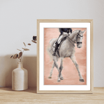 Ballet - Dressage Horse Fine Art Print displayed in a light wood frame on a wooden shelf with a ceramic vase, ideal for equestrian-themed decor.