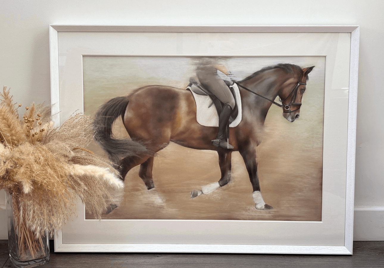 Dressage horse original painting leaning against a wall beside pampas grass decor. Elegant country home artwork for horse lovers and collectors.