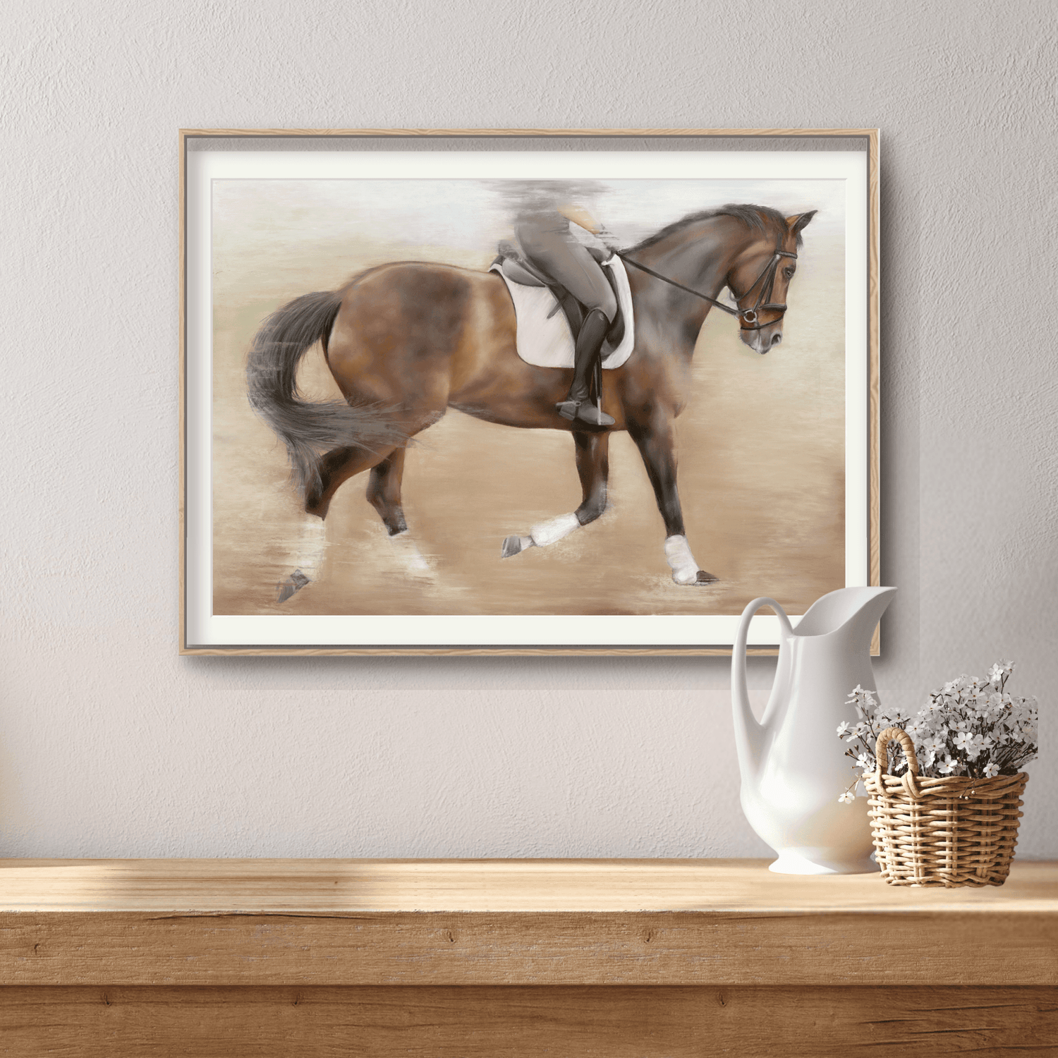 Framed Dressage Training Fine Art Print On Paper showing a horse and rider in motion, displayed above a rustic console with floral decor.