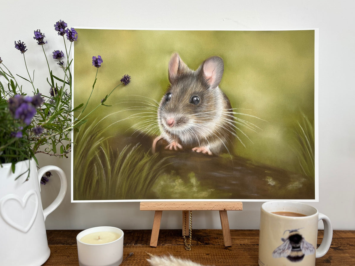 Field Mouse Fine Art Print On Paper shown on a wooden table with lavender, candle, and tea mug, perfect for cozy country interior design.