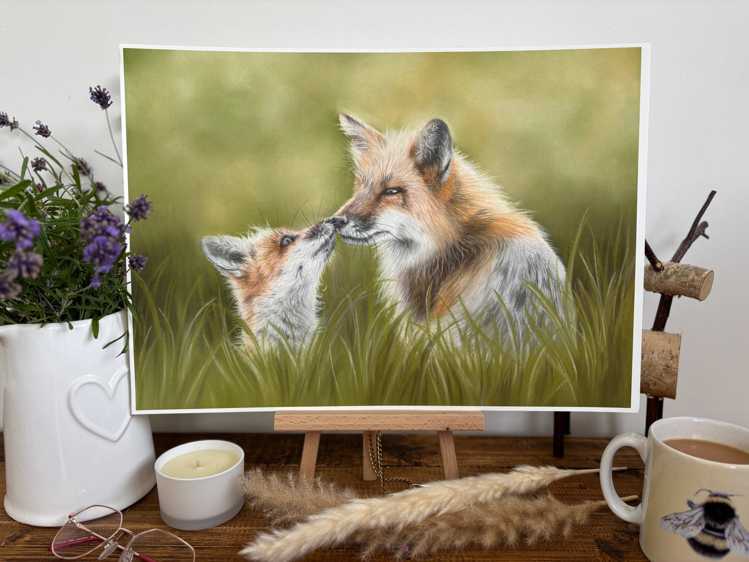 Fox & Cub Fine Art Print On Paper on mini easel surrounded by rustic decor, perfect for country-style interior design.