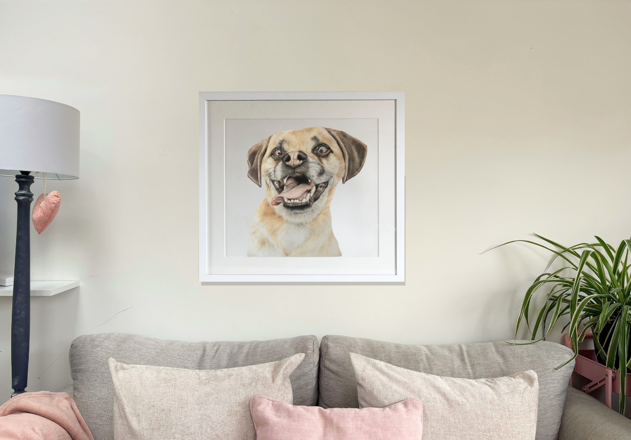 Framed dog painting 'Welcome Home' by Georgie Turner hung in a cozy living room. Perfect wall art for country-style home interiors.