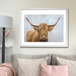 Scottish Highland Cow Wall Art | Original Pastel Painting displayed above a neutral-toned sofa, ideal for rustic farmhouse decor.