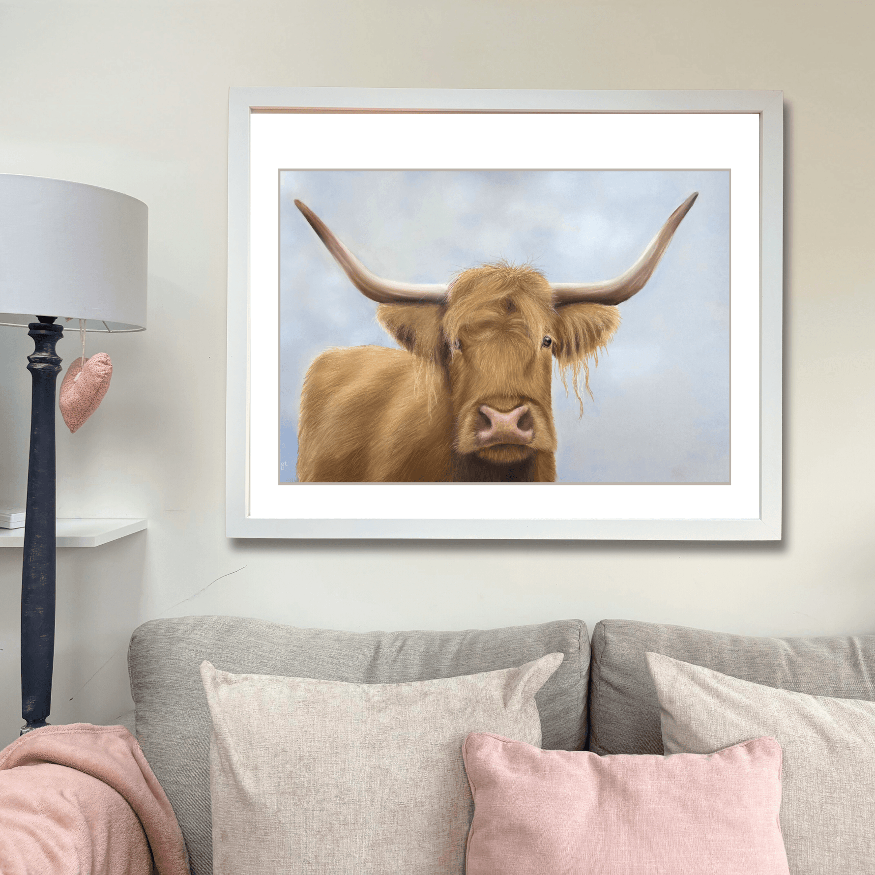Scottish Highland Cow Wall Art | Original Pastel Painting displayed above a neutral-toned sofa, ideal for rustic farmhouse decor.
