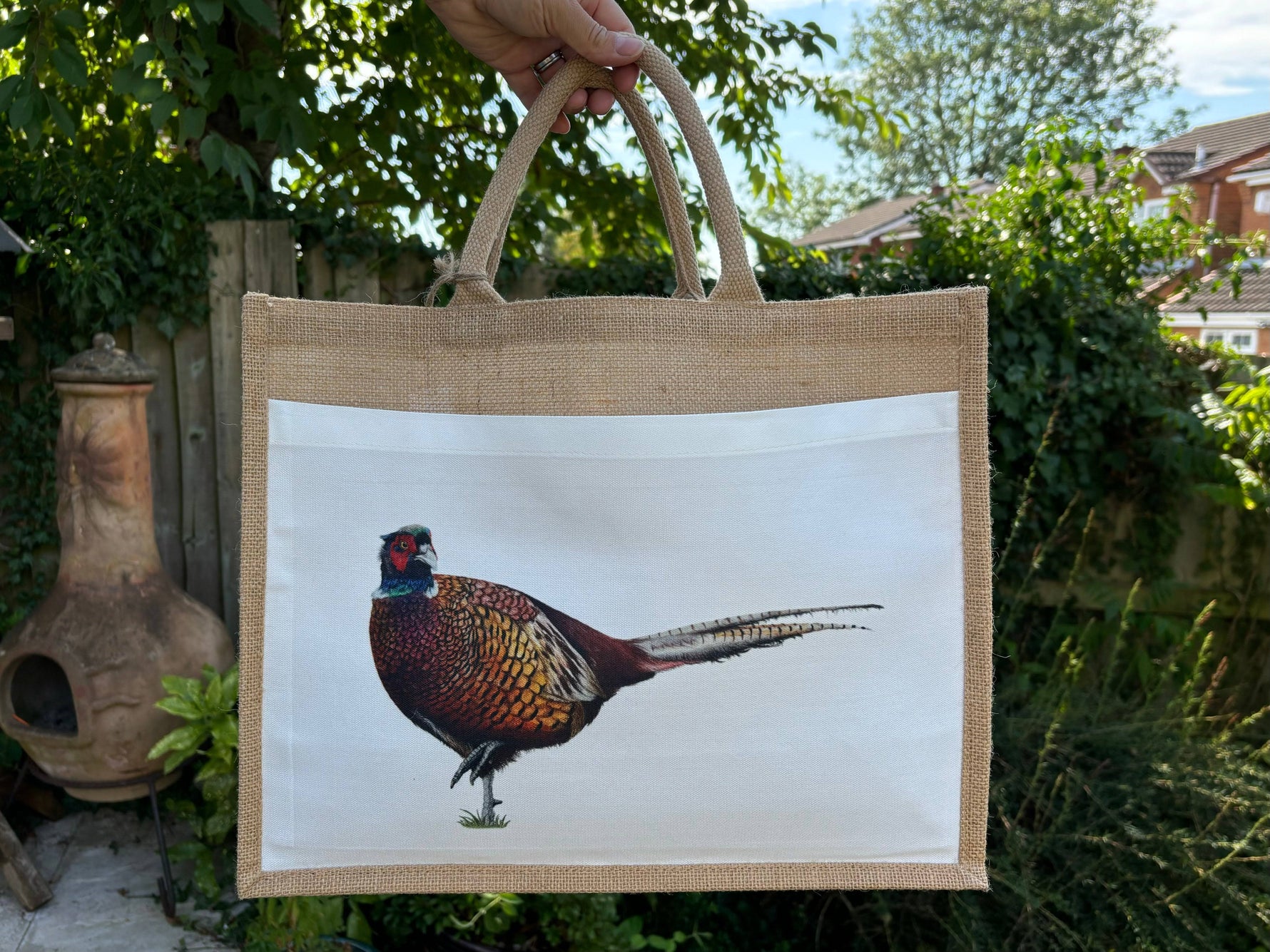 Pheasant Jute Shopping Bag featuring a vivid pheasant illustration on a white panel, ideal for eco-conscious shoppers and country living enthusiasts.