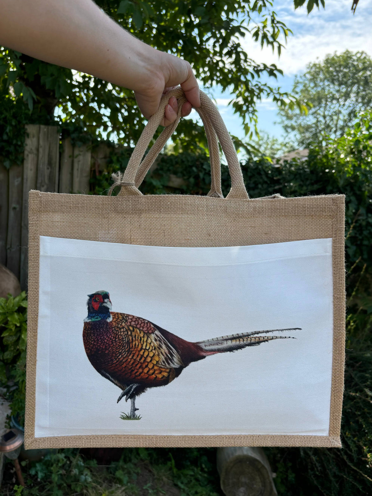 Front view of Pheasant Jute Shopping Bag with detailed pheasant artwork by Georgie Turner, great for game shoot lovers and sustainable shopping.
