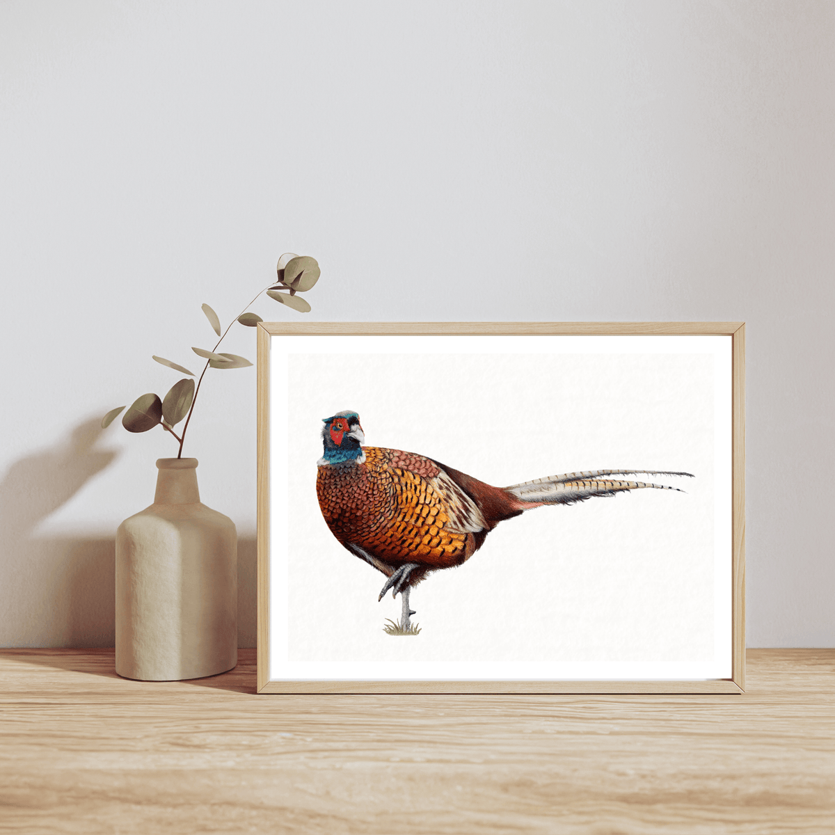 Limited Edition Pheasant Fine Art Print - Country Wall Art styled with a ceramic vase, enhancing traditional field sport-themed decor.
