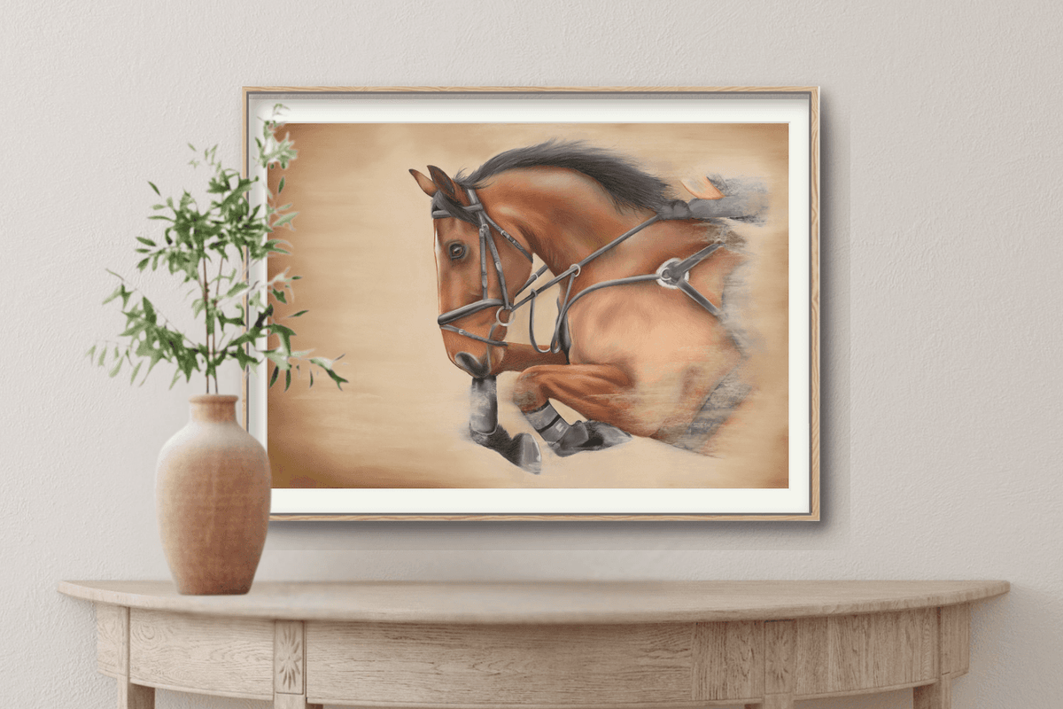 Equestrian-themed Showjumping Fine Art Print On Paper in a light wood frame, styled above a curved console table with a ceramic vase.