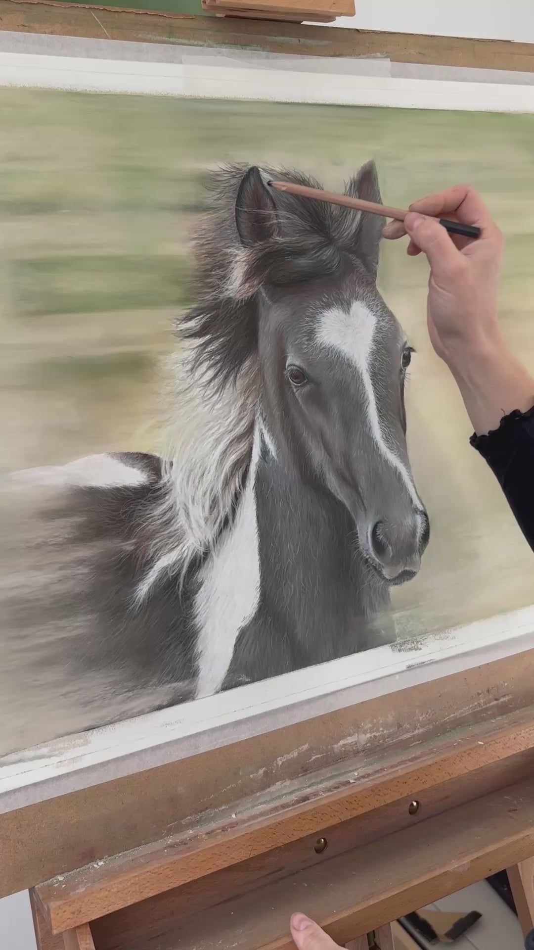 Artist hand-painting the original horse artwork 'Flying Free,' showcasing fine detail in this equestrian-themed country decor painting.