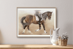 Equestrian-themed Dressage Training Fine Art Print On Paper, framed and hung on a neutral wall with a pitcher and wicker basket for decor.
