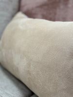 Back view of the Snaffle Cushion in soft beige fabric, perfect for blending with neutral country home decor themes.