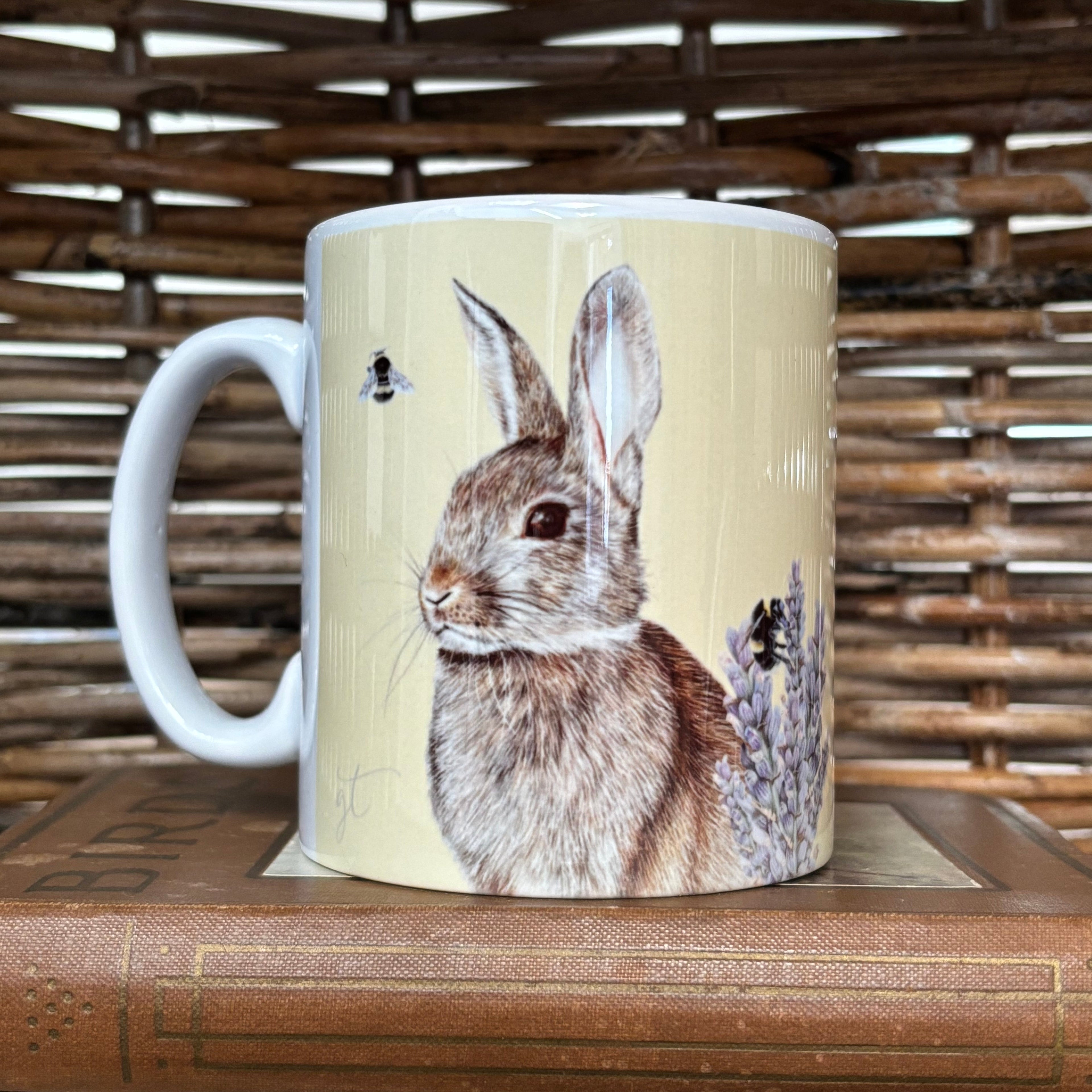 Mug with a rabbit design on a textured surface