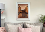 Equestrian-themed original artwork 'Through The Ears' hung above a couch, showcasing large wall art for country-inspired home interiors.